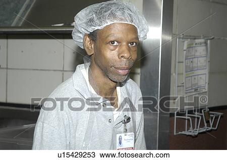 Stock Image - Closeup of a man with disabilities while working.. Fotosearch