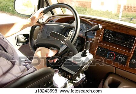 Man with a disability driving a van with hand controls. View Large Photo Image Stock Photo - Man with a disability driving a van with hand controls.. Fotosearch