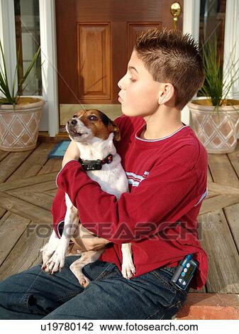 Young boy with diabetics, plays with his dog. View Large Photo Image Stock Image - Young boy with diabetics, plays with his dog.. Fotosearch