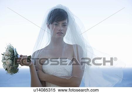 A bored bride waiting for the groom View Large Photo Image Stock Photography - A bored bride waiting for the groom. Fotosearch
