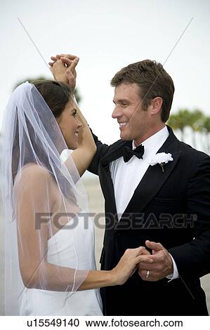 A bride and groom dancing View Large Photo Image Stock Image - A bride and groom dancing. Fotosearch