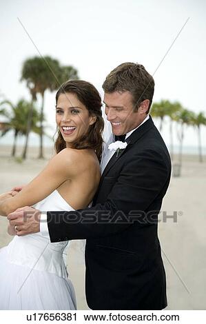 A bride and groom dancing View Large Photo Image Stock Image - A bride and groom dancing. Fotosearch