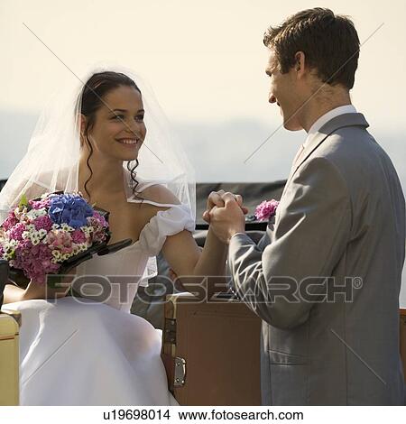 A bride and groom View Large Photo Image Picture - A bride and groom. Fotosearch