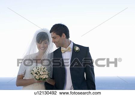 A bride and groom View Large Photo Image Stock Image - A bride and groom. Fotosearch