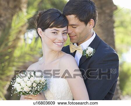 Stock Photo - A bride and groom. Fotosearch