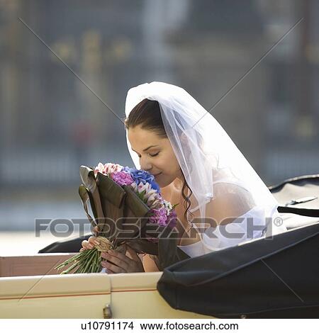 Picture - A bride arriving for her wedding. Fotosearch