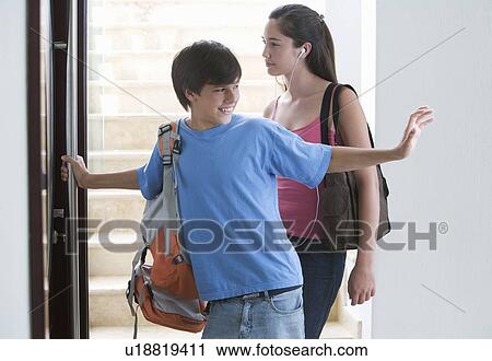 A brother and sister going to school View Large Photo Image Stock Image - A brother and sister going to school. Fotosearch