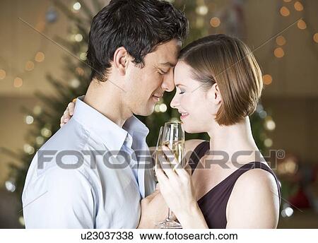 A couple drinking champagne View Large Photo Image Stock Photo - A couple drinking champagne. Fotosearch