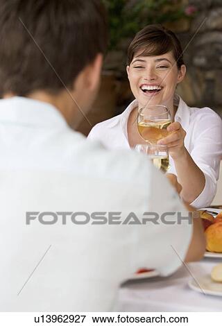 A couple sharing a romantic meal View Large Photo Image Stock Photo - A couple sharing a romantic meal. Fotosearch