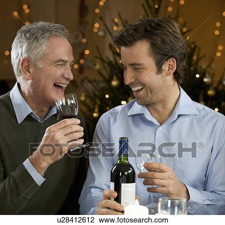 A father and son drinking wine View Large Photo Image Stock Image - A father and son drinking wine. Fotosearch