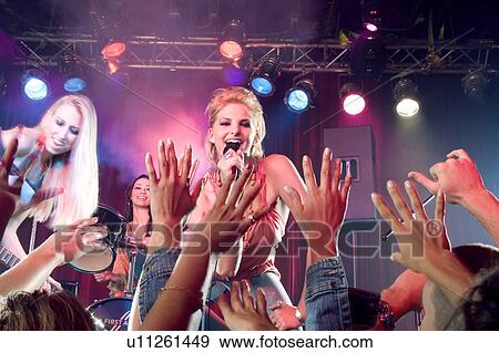 A girl pop group performing View Large Photo Image Stock Photo - A girl pop group performing. Fotosearch