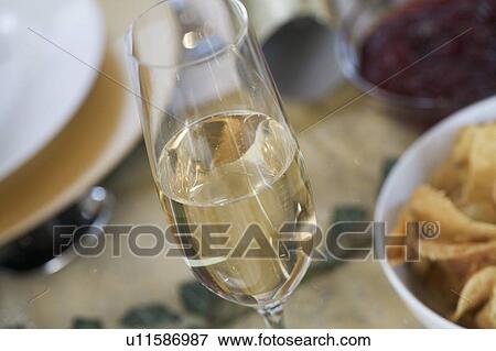 A glass of champagne View Large Photo Image Stock Photo - A glass of champagne. Fotosearch