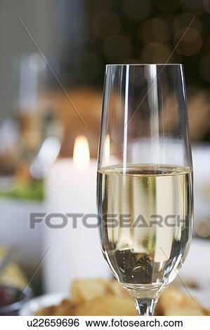 A glass of champagne View Large Photo Image Stock Photograph - A glass of champagne. Fotosearch