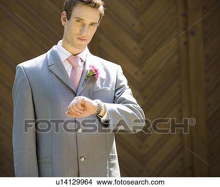 A groom waiting for the bride View Large Photo Image Picture - A groom waiting for the bride. Fotosearch