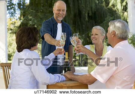 A group of senior couples celebrating View Large Photo Image Stock Image - A group of senior couples celebrating. Fotosearch
