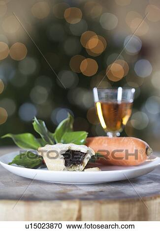 Stock Image - A mince pie for Santa and a carrot for Rudolf. Fotosearch