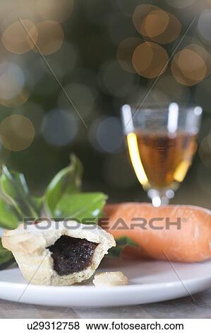 A mince pie for Santa and a carrot for Rudolf View Large Photo Image Stock Photo - A mince pie for Santa and a carrot for Rudolf. Fotosearch