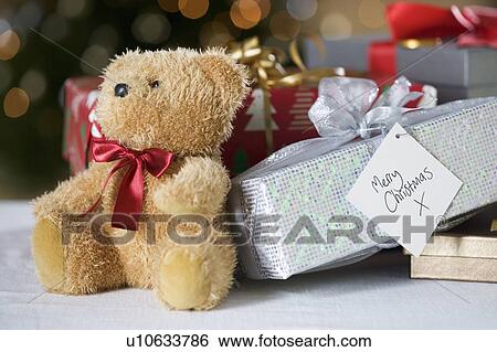 Stock Photograph - A pile of Christmas presents. Fotosearch