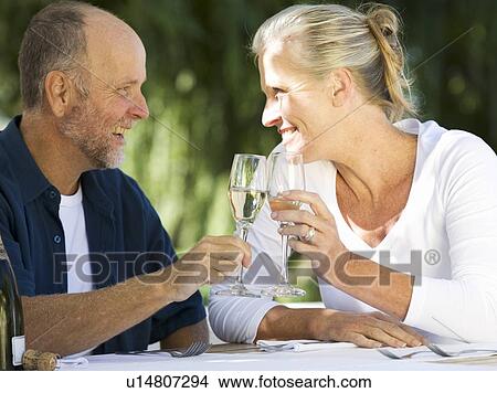 A senior couple celebrating View Large Photo Image Picture - A senior couple celebrating. Fotosearch