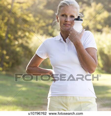 A senior woman keeping fit View Large Photo Image Stock Image - A senior woman keeping fit. Fotosearch