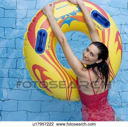 A woman having fun in a waterpark View Large Photo Image Stock Image - A woman having fun in a waterpark. Fotosearch