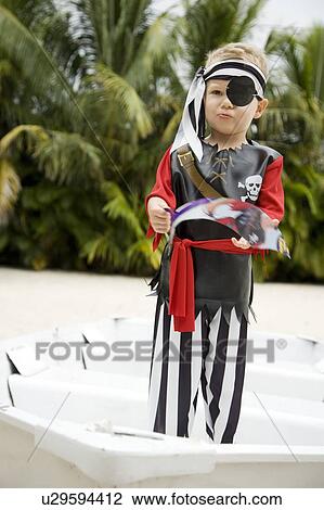 A young boy dressed as a pirate View Large Photo Image Stock Image - A young boy dressed as a pirate. Fotosearch