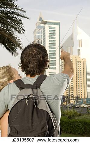 Stock Photo - A young couple on a city break. Fotosearch