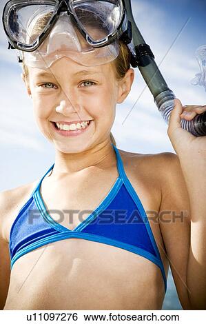 A young girl in snorkeling gear View Large Photo Image Stock Photograph - A young girl in snorkeling gear. Fotosearch