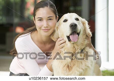 A young girl with her pet dog View Large Photo Image Stock Photo - A young girl with her pet dog. Fotosearch