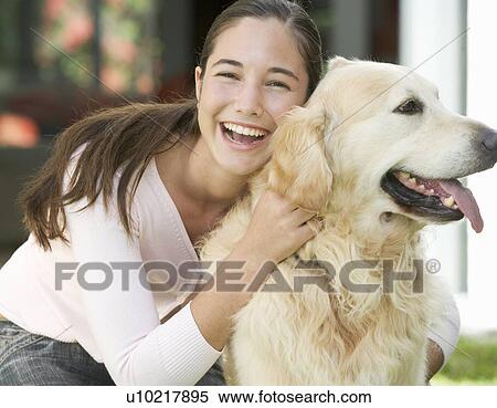 A young girl with her pet dog View Large Photo Image Stock Photography - A young girl with her pet dog. Fotosearch