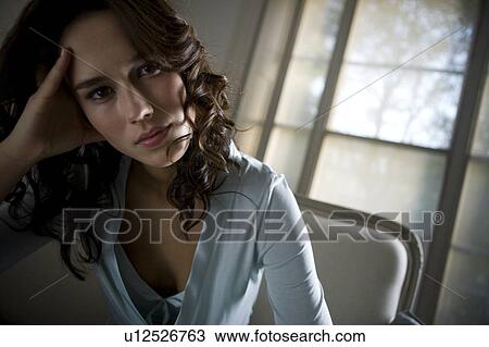 A young woman wearing silk pyjamas View Large Photo Image Stock Image - A young woman wearing silk pyjamas. Fotosearch