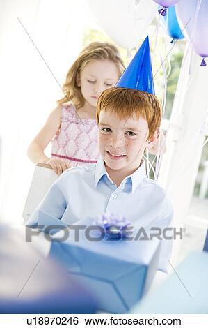 boy and girl at birthday party View Large Photo Image Stock Photograph - boy and girl at birthday party. Fotosearch