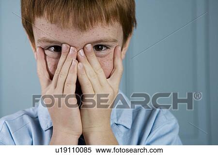 boy with ginger hair playing peek a boo through fingers View Large Photo Image Stock Photography - boy with ginger hair playing peek a boo through fingers. Fotosearch