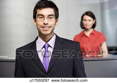 Businessman at office reception View Large Photo Image Stock Photo - Businessman at office reception. Fotosearch