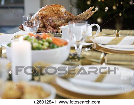 Stock Image - Christmas dinner on the table. Fotosearch