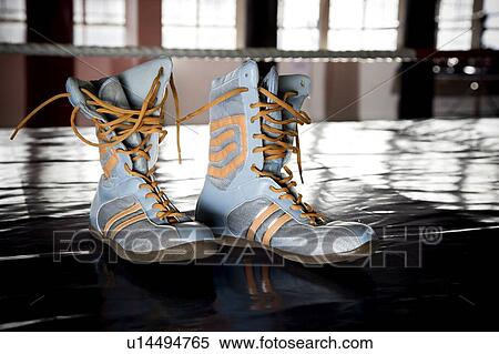 Close up of boxers boots on a training floor View Large Photo Image Stock Photography - Close up of boxers boots on a training floor . Fotosearch