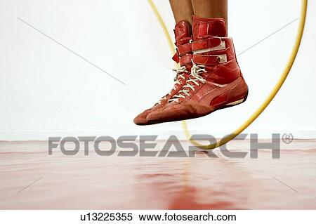 Stock Photography - Close up of boxer's feet skipping. Fotosearch