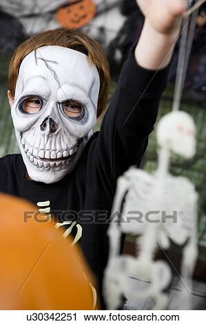 Little boy at a Halloween party View Large Photo Image Stock Image - Little boy at a Halloween party . Fotosearch