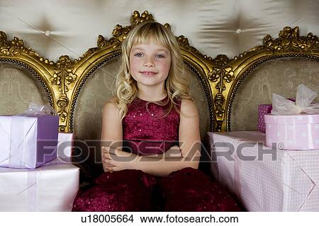 Little girl with birthday presents View Large Photo Image Picture - Little girl with birthday presents . Fotosearch