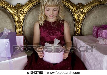 Little girl with birthday presents View Large Photo Image Stock Image - Little girl with birthday presents . Fotosearch