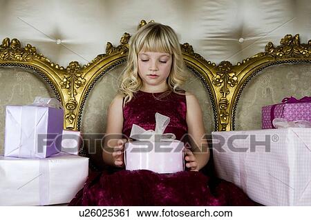 Little girl with birthday presents View Large Photo Image Stock Image - Little girl with birthday presents . Fotosearch
