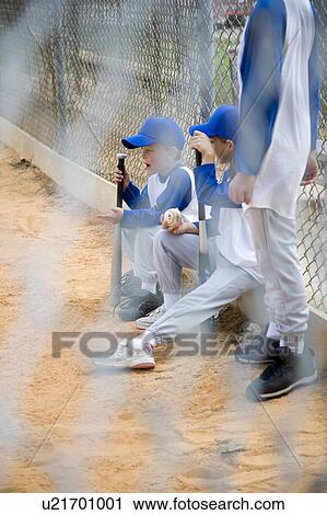 Little league baseball team seen through wire fence View Large Photo Image Stock Image - Little league baseball team seen through wire fence. Fotosearch