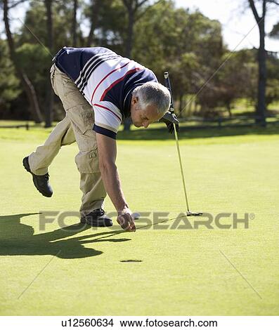 Man playing golf View Large Photo Image Picture - Man playing golf. Fotosearch