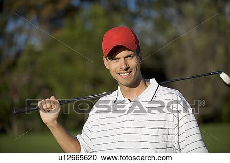 Man playing golf View Large Photo Image Stock Image - Man playing golf. Fotosearch