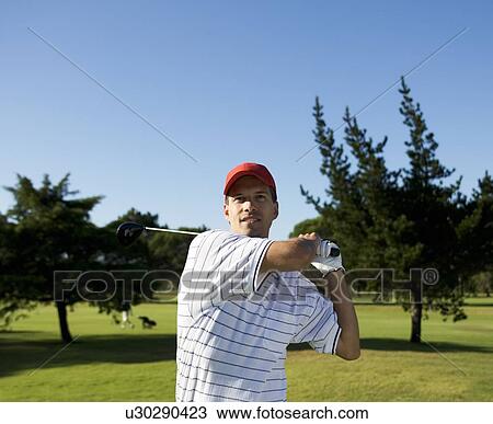 Man playing golf View Large Photo Image Stock Image - Man playing golf. Fotosearch