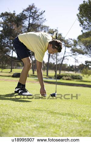 Man playing golf View Large Photo Image Stock Photo - Man playing golf. Fotosearch
