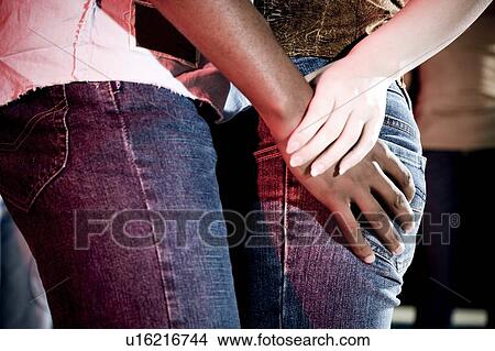 man with hand on woman's hip View Large Photo Image Picture - man with hand on woman's hip . Fotosearch
