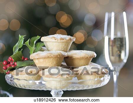 Stock Photograph - Mince pies and champagne. Fotosearch