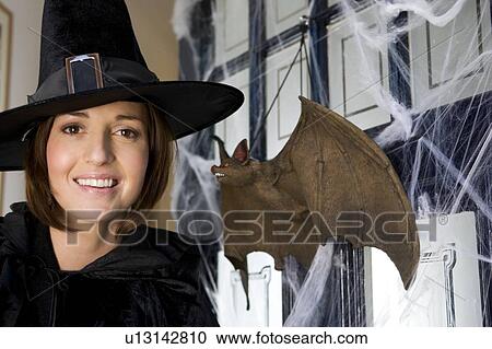 Mother dressed up as a witch for Halloween View Large Photo Image Stock Image - Mother dressed up as a witch for Halloween. Fotosearch