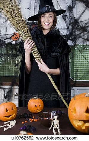 Mother in fancy dress at a Halloween party View Large Photo Image Stock Image - Mother in fancy dress at a Halloween party . Fotosearch